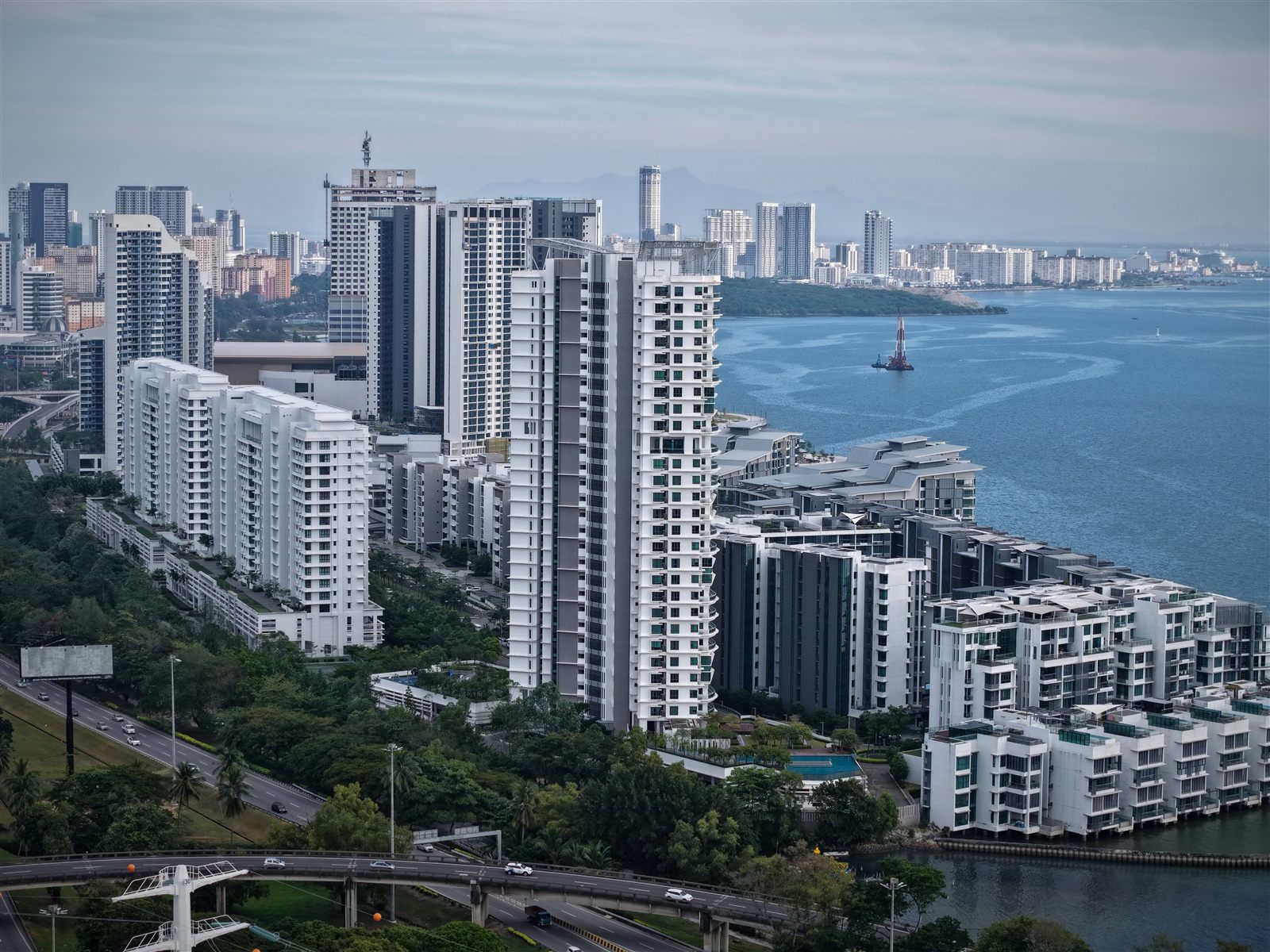 Penang coastal waterfront arrival for long-distance MPV transfer